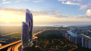 Safa One by DAMAC in Safa Park illuminated aerial sunset view overlooking Dubai skyline and Gulf coastline - Presented by Tohid Fetrat