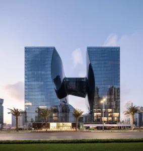 The Opus Penthouse by OMNIYAT iconic exterior architecture with sculptural glass façade and landmark contemporary design in Dubai - Presented by Tohid Fetrat