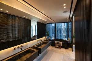 The Opus Penthouse by OMNIYAT luxury bathroom suite with marble finishes, double vanity, and skyline views in Dubai - Presented by Tohid Fetrat