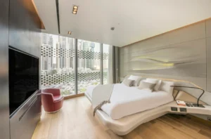 The Opus Residences by OMNIYAT luxury 1 bedroom interior with floor to ceiling windows in Dubai - Presented by Tohid Fetrat