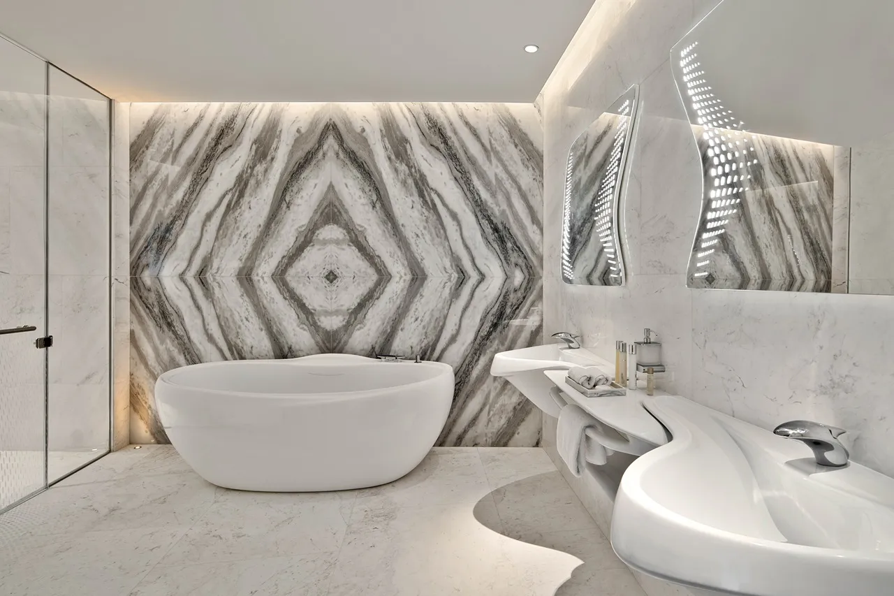 The Opus Residences by OMNIYAT luxury 2 bedroom marble bathroom interior with freestanding bathtub in Dubai - Presented by Tohid Fetrat