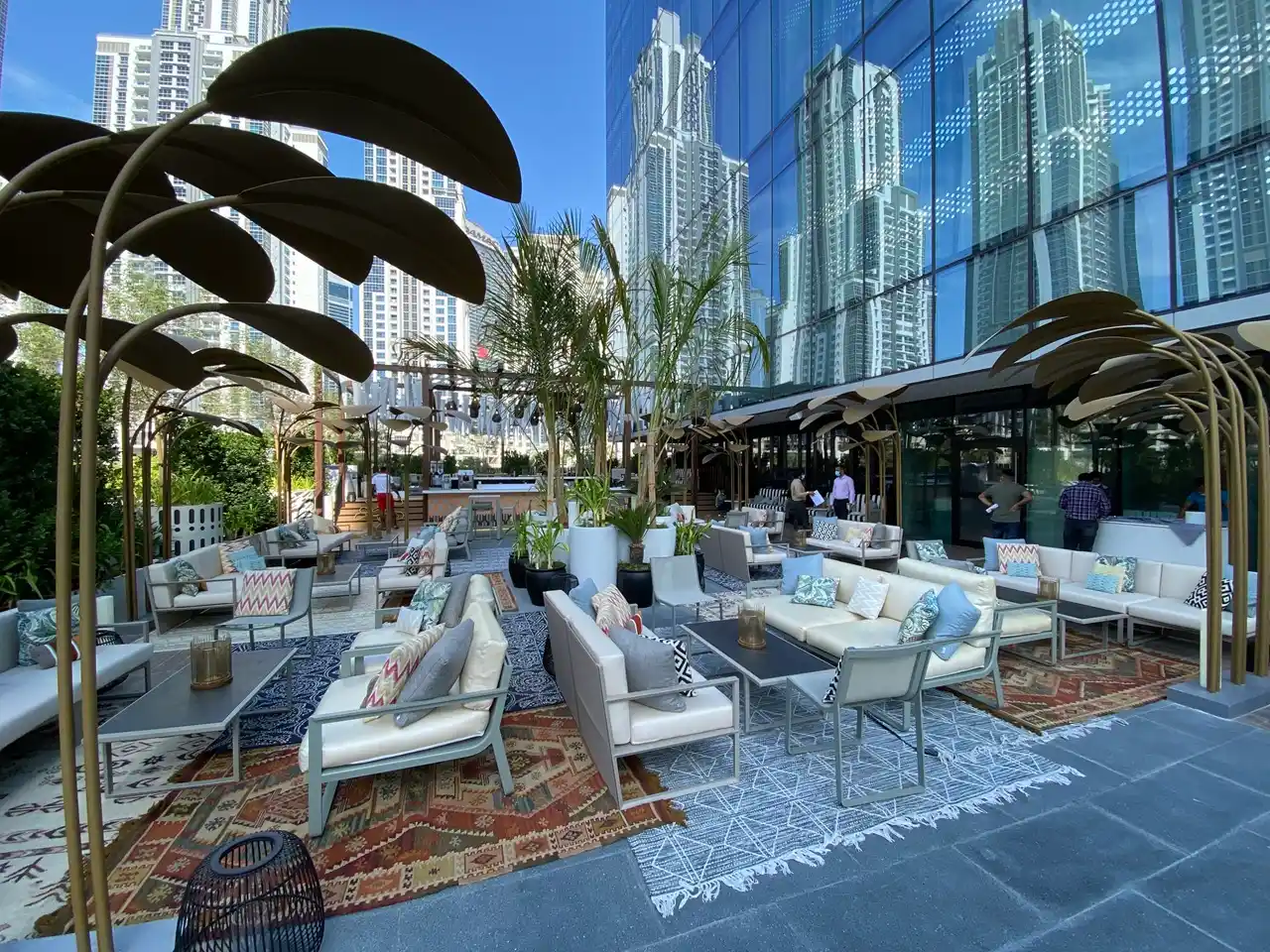 The Opus Residences by OMNIYAT Deseo Rooftop Lounge outdoor seating area in Dubai - Presented by Tohid Fetrat