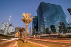 The Opus Residences by OMNIYAT night exterior view near Burj Khalifa in Dubai - Presented by Tohid Fetrat