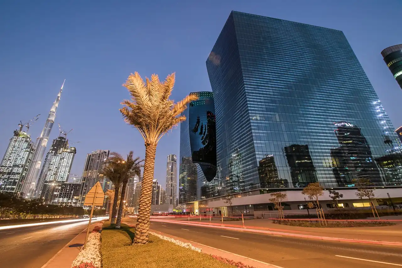 The Opus Residences by OMNIYAT night exterior view near Burj Khalifa in Dubai - Presented by Tohid Fetrat