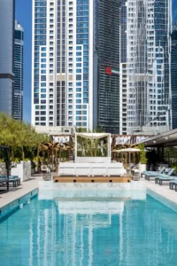 The Opus Residences by OMNIYAT luxury outdoor swimming pool area in Dubai - Presented by Tohid Fetrat