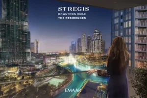 The St. Regis Residences Downtown Dubai by Emaar balcony overlooking the Dubai Fountain and Downtown Dubai skyline at night in Dubai - Presented by Tohid Fetrat