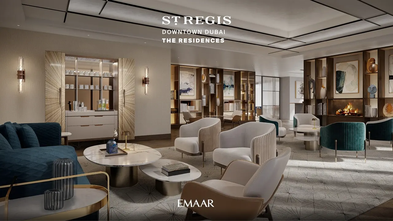 The St. Regis Residences Downtown Dubai by Emaar residents library lounge with elegant seating, curated shelving, and hospitality inspired interiors in Dubai - Presented by Tohid Fetrat