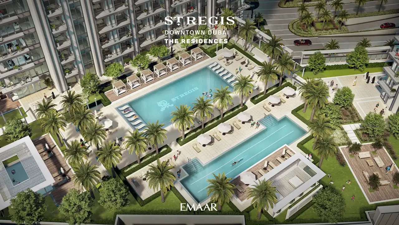 The St. Regis Residences Downtown Dubai by Emaar aerial view of resort style swimming pools, cabanas, and landscaped leisure amenities in Dubai - Presented by Tohid Fetrat