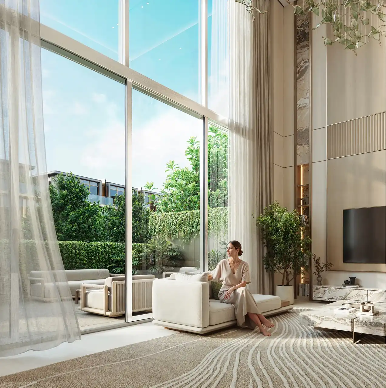 Tilal Binghatti Grand Villa double-height living room with floor-to-ceiling windows, landscaped terrace views, and luxury contemporary interiors in Dubai - Presented by Tohid Fetrat