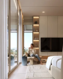 Tilal Binghatti Mansion bedroom lounge corner with panoramic windows, custom shelving, and refined contemporary interiors in Dubai - Presented by Tohid Fetrat