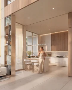 Tilal Binghatti Mansion luxury kitchen interior with marble island, double-height ceilings, and contemporary designer finishes in Dubai - Presented by Tohid Fetrat