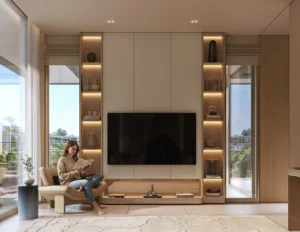 Tilal Binghatti Mansion luxury family lounge with custom TV wall, illuminated shelving, and contemporary interiors in Dubai - Presented by Tohid Fetrat