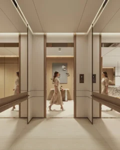 Private elevator lobby interior at Tilal Binghatti Villa featuring mirrored walls, contemporary finishes, and refined luxury villa design in Dubai - Presented by Tohid Fetrat