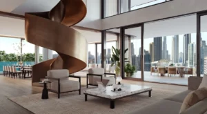 VELA Dorchester Collection by Omniyat duplex residence living area with sculptural spiral staircase and panoramic Dubai skyline views in Dubai - Presented by Tohid Fetrat
