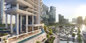 VELA Dorchester Collection by Omniyat waterfront architecture overlooking Dubai marina and yacht harbor in Dubai - Presented by Tohid Fetrat