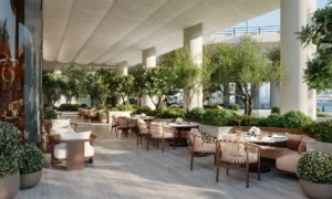 VELA Viento Dorchester Collection by Omniyat luxury cafe and outdoor lounge surrounded by landscaped greenery in Dubai - Presented by Tohid Fetrat