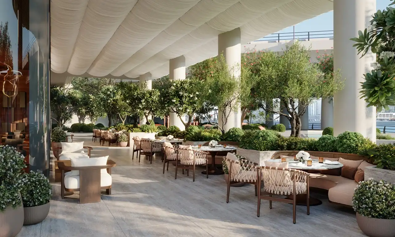 VELA Viento Dorchester Collection by Omniyat luxury cafe and outdoor lounge surrounded by landscaped greenery in Dubai - Presented by Tohid Fetrat