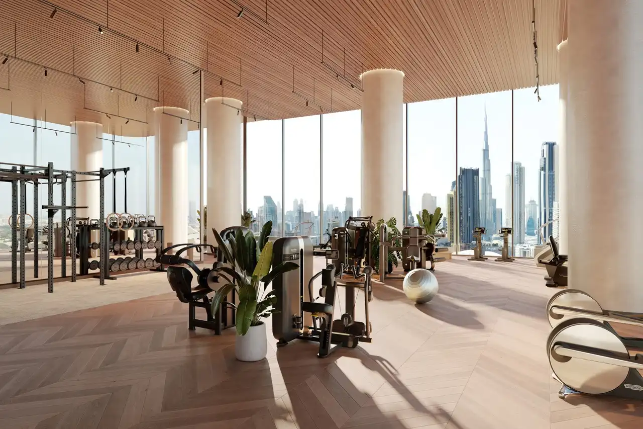 VELA Viento Dorchester Collection by Omniyat luxury fitness center with Burj Khalifa skyline view in Dubai - Presented by Tohid Fetrat