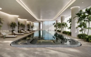 VELA Viento Dorchester Collection by Omniyat luxury indoor wellness pool with resort style lounge seating in Dubai - Presented by Tohid Fetrat