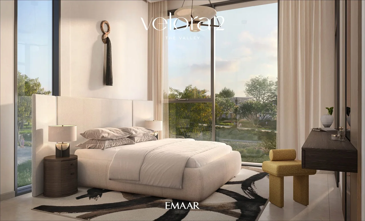 Velora 2 at The Valley by Emaar modern bedroom interior with floor to ceiling windows and elegant furnishings in Dubai - Presented by Tohid Fetrat