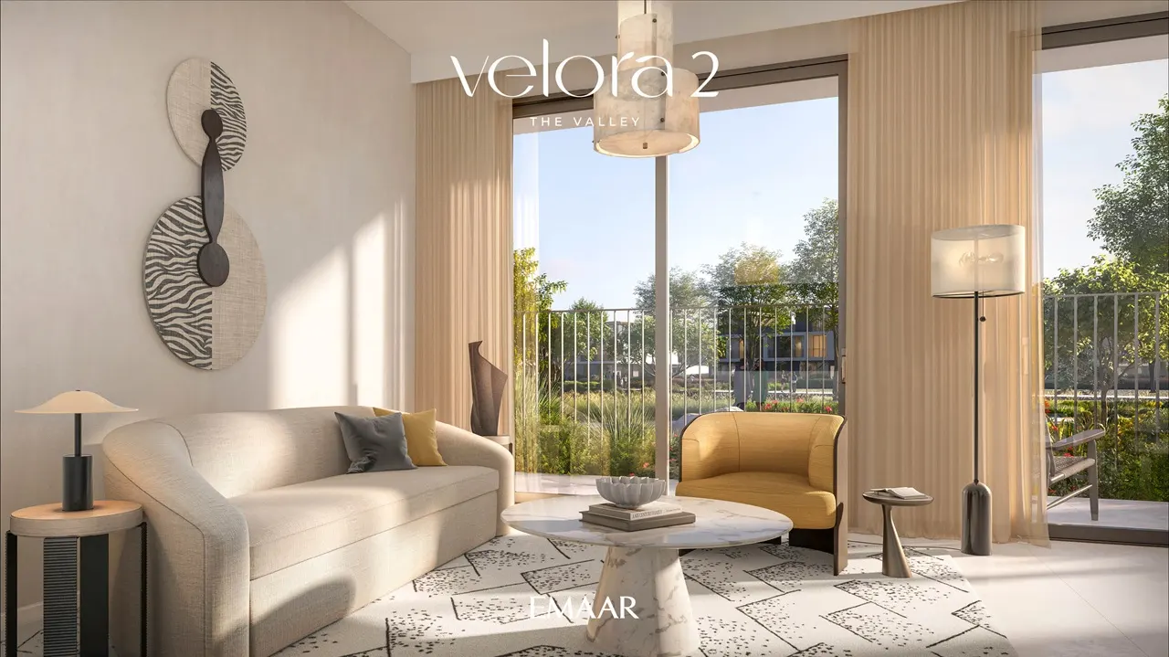 Velora 2 at The Valley by Emaar modern living room interior with floor to ceiling windows and elegant furnishings in Dubai - Presented by Tohid Fetrat