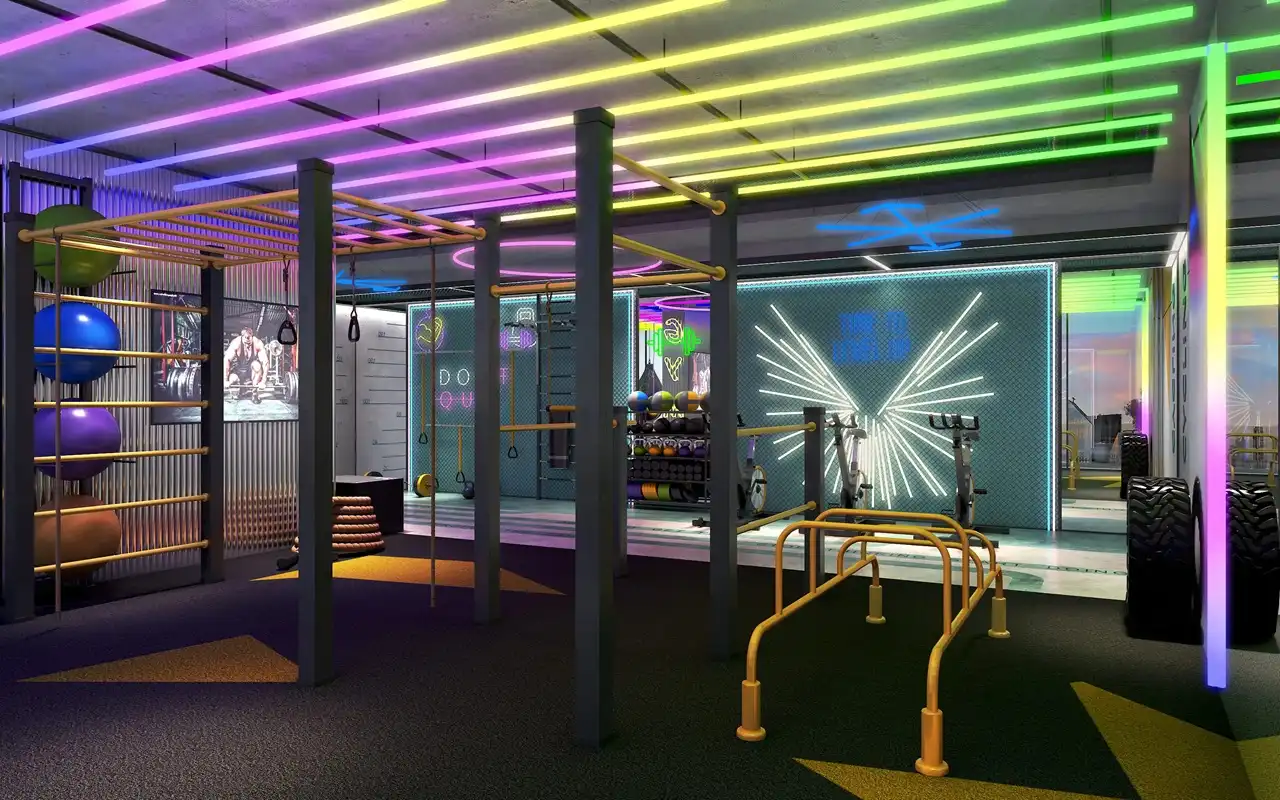 Volta by DAMAC in Downtown Dubai fitness training zone with strength equipment and neon inspired gym design in Dubai - Presented by Tohid Fetrat