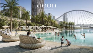 AEON at Dubai Creek Harbour by Emaar Properties residential towers with beach lagoon, palm trees, sun loungers, bridge views and family leisure spaces in Dubai Presented by Tohid Fetrat