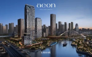 AEON at Dubai Creek Harbour by Emaar Properties residential towers with creek waterfront, skyline views, bridge architecture and evening city lights in Dubai Presented by Tohid Fetrat
