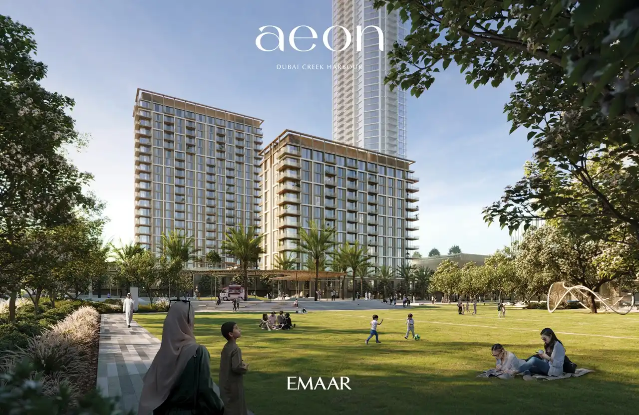 AEON at Dubai Creek Harbour by Emaar Properties residential towers with landscaped park, open green lawn, trees and outdoor family spaces in Dubai Presented by Tohid Fetrat