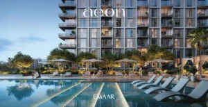 AEON at Dubai Creek Harbour by Emaar Properties residential tower facade with pool deck, sun loungers, shaded cabanas and landscaped greenery in Dubai Presented by Tohid Fetrat