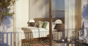 Arancia at The Yards by Beyond Developments bedroom interior viewed from a private terrace with floor to ceiling glazing in Dubai Presented by Tohid Fetrat