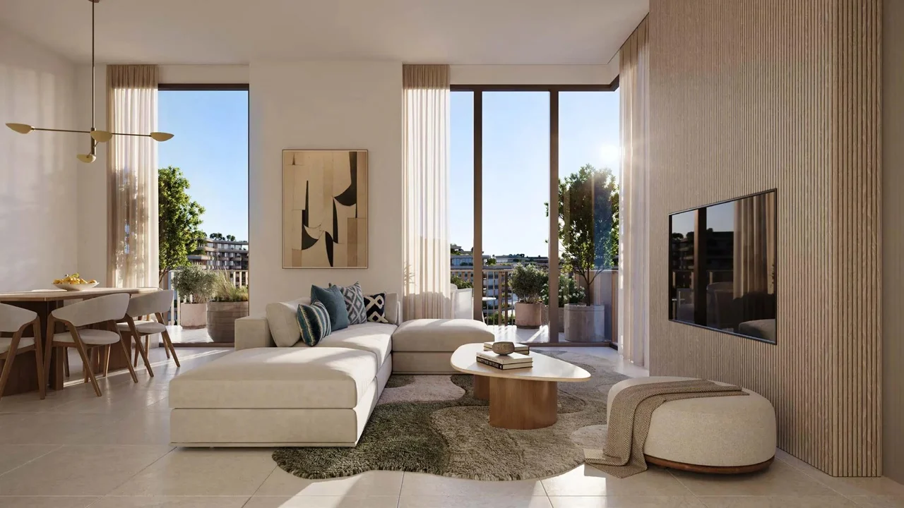 Arancia at The Yards by Beyond Developments living room interior with double height windows and private terrace view in Dubai Presented by Tohid Fetrat