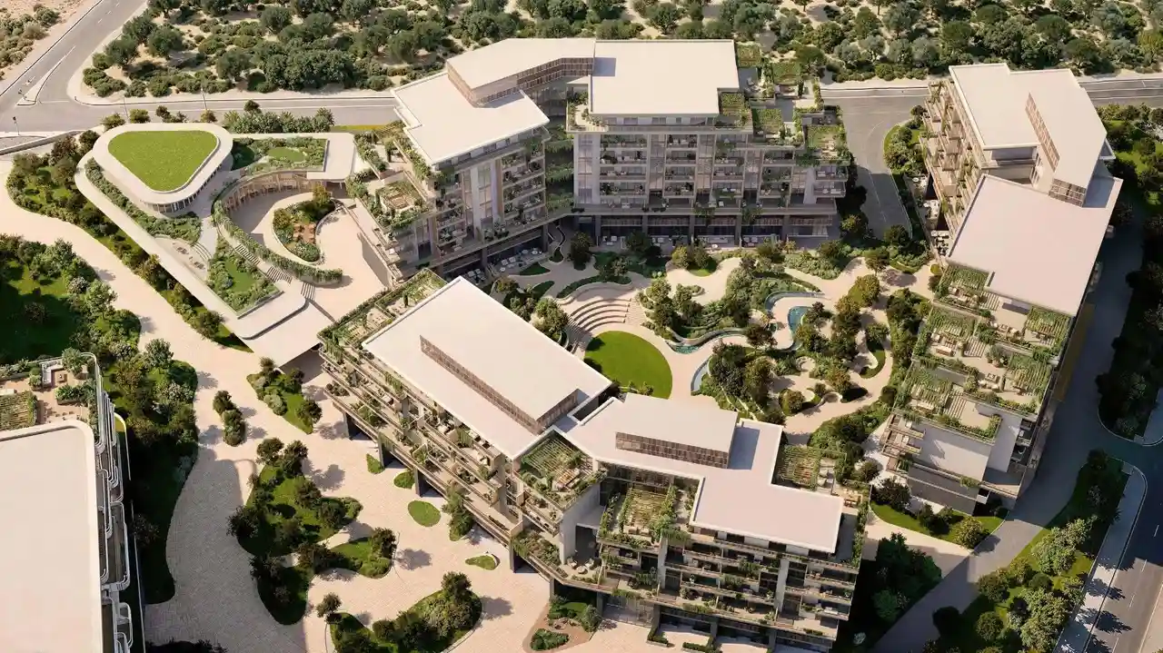 Arancia at The Yards by Beyond Developments masterplan aerial view featuring landscaped courtyards green terraces and residential buildings in Dubai Presented by Tohid Fetrat