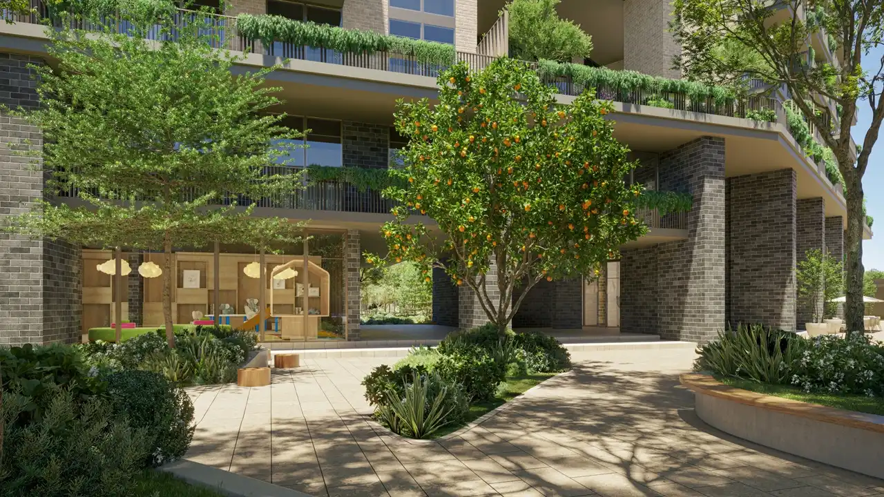 Arancia at The Yards by Beyond Developments outdoor lobby entrance surrounded by landscaped gardens and citrus trees in Dubai - Presented by Tohid Fetrat