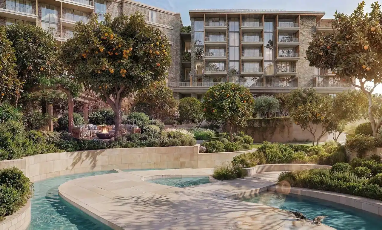 Arancia at The Yards by Beyond Developments landscaped water feature surrounded by gardens and residential buildings in Dubai Presented by Tohid Fetrat