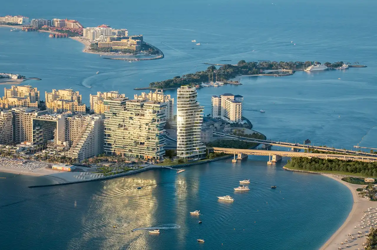 AVA at Palm Jumeirah, Dorchester Collection by OMNIYAT aerial waterfront location overlooking Palm Jumeirah shoreline and luxury residences in Dubai Presented by Tohid Fetrat