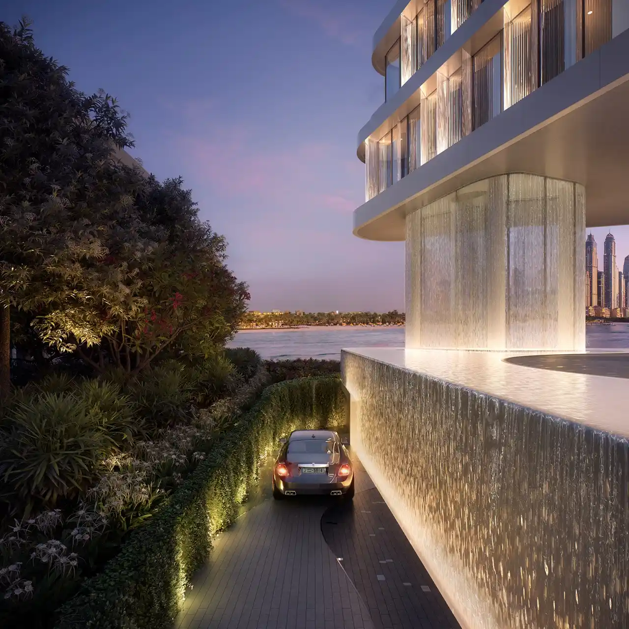 AVA at Palm Jumeirah, Dorchester Collection by OMNIYAT private arrival experience with cascading water features and landscaped surroundings in Dubai Presented by Tohid Fetrat