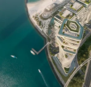AVA at Palm Jumeirah, Dorchester Collection by OMNIYAT rooftop amenities and waterfront architecture overlooking the coastline in Dubai Presented by Tohid Fetrat