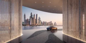 AVA at Palm Jumeirah, Dorchester Collection by OMNIYAT waterfront arrival experience with panoramic Dubai Marina skyline views in Dubai Presented by Tohid Fetrat