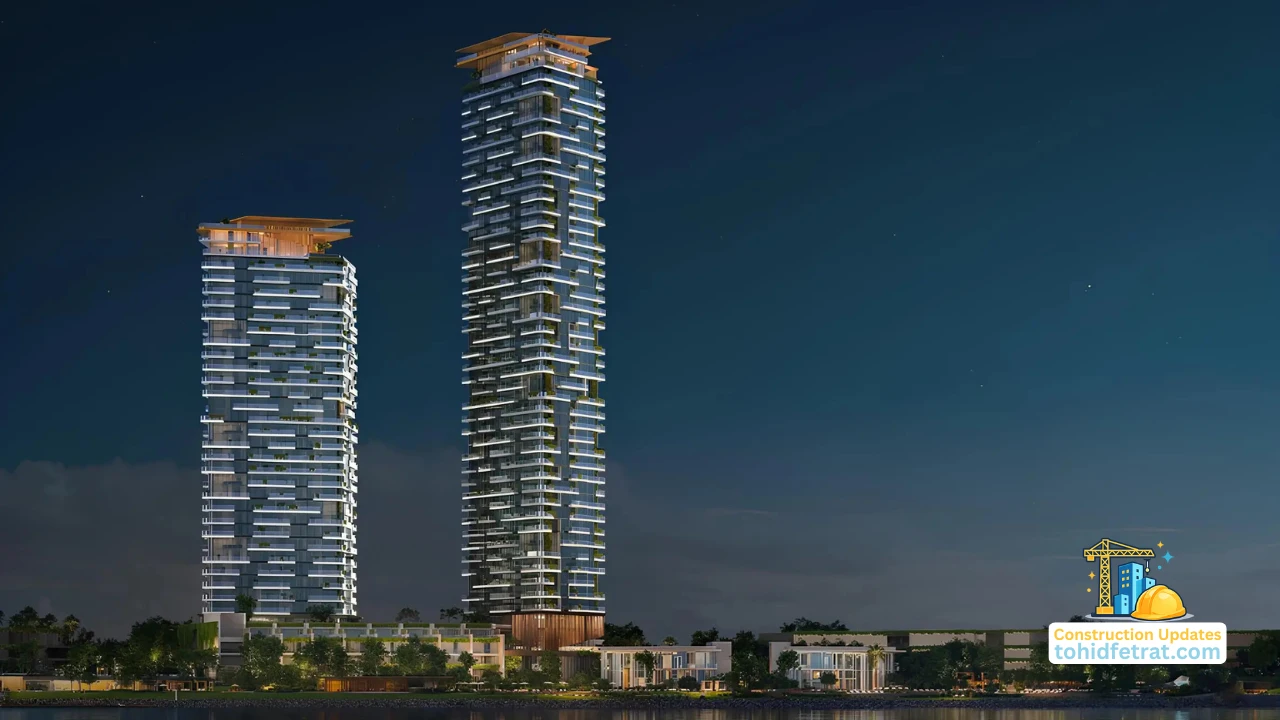 Beyond Developments Construction Updates showing illuminated waterfront residential towers and surrounding landscaped areas at night Presented by Tohid Fetrat