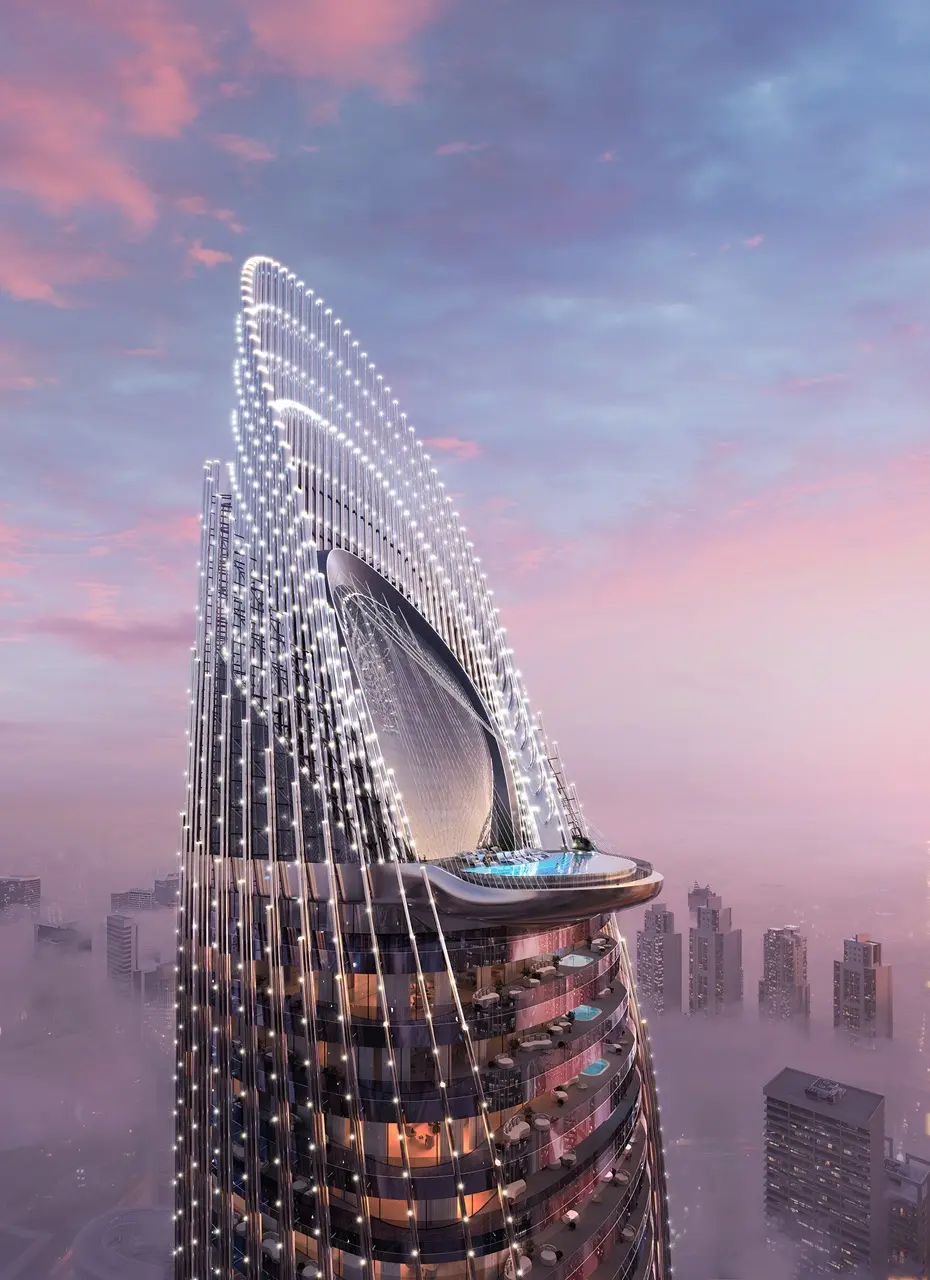 Binghatti Skyblade by Binghatti illuminated architectural crown with elevated sky pool and sculptural facade design above the Dubai skyline - Presented by Tohid Fetrat