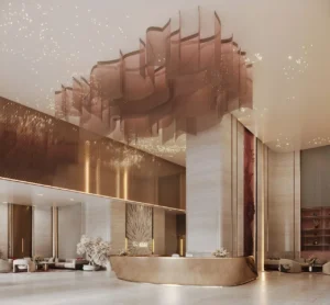Binghatti Skyblade by Binghatti luxury reception lobby with artistic chandelier premium finishes elegant seating areas and contemporary interior design in Dubai - Presented by Tohid Fetrat