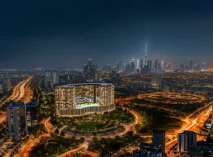 Binghatti Wraith at Al Jaddaf by Binghatti illuminated residential tower with Dubai skyline and Burj Khalifa night view in Dubai - Presented by Tohid Fetrat