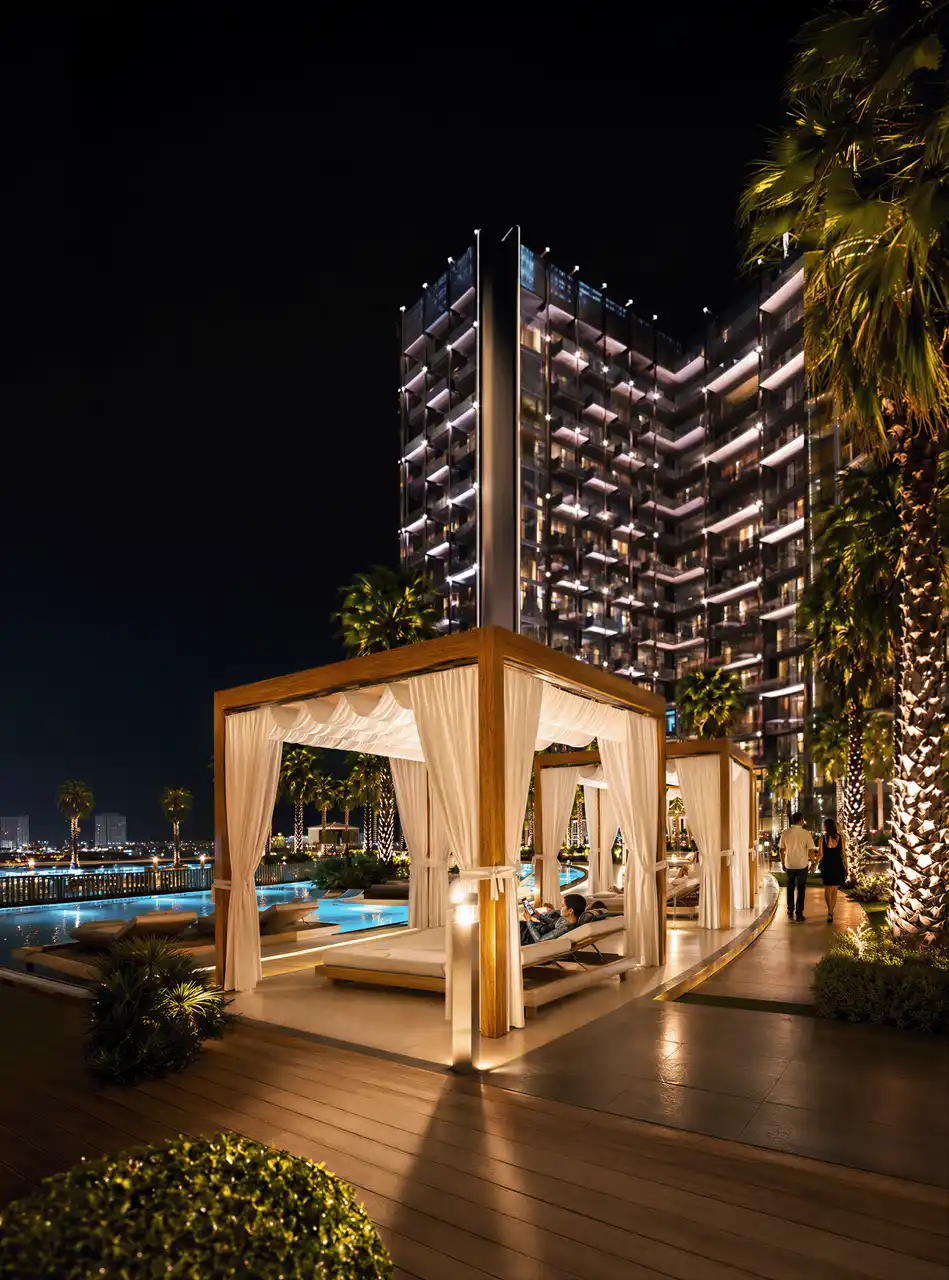 Binghatti Wraith at Al Jaddaf by Binghatti luxury poolside cabanas with resort style amenities and illuminated waterfront setting in Dubai - Presented by Tohid Fetrat