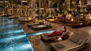 Binghatti Wraith at Al Jaddaf by Binghatti resort style swimming pool with private cabanas, lounge seating and landscaped surroundings in Dubai - Presented by Tohid Fetrat