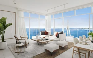 Bluewaters Bay at Bluewaters Island by Meraas contemporary living room with floor to ceiling windows and waterfront views in Dubai Presented by Tohid Fetrat