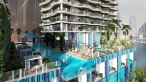 CHIC Tower by DAMAC in Business Bay infinity pool deck with luxury cabanas resort style amenities and canal views in Dubai Presented by Tohid Fetrat