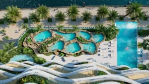 CHIC Tower by DAMAC in Business Bay lagoon style pools and infinity swimming pool surrounded by tropical landscaping in Dubai Presented by Tohid Fetrat