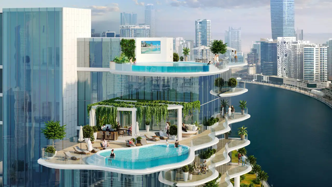 CHIC Tower by DAMAC in Business Bay elevated sky pool terrace with infinity pools landscaped decks and canal views in Dubai Presented by Tohid Fetrat