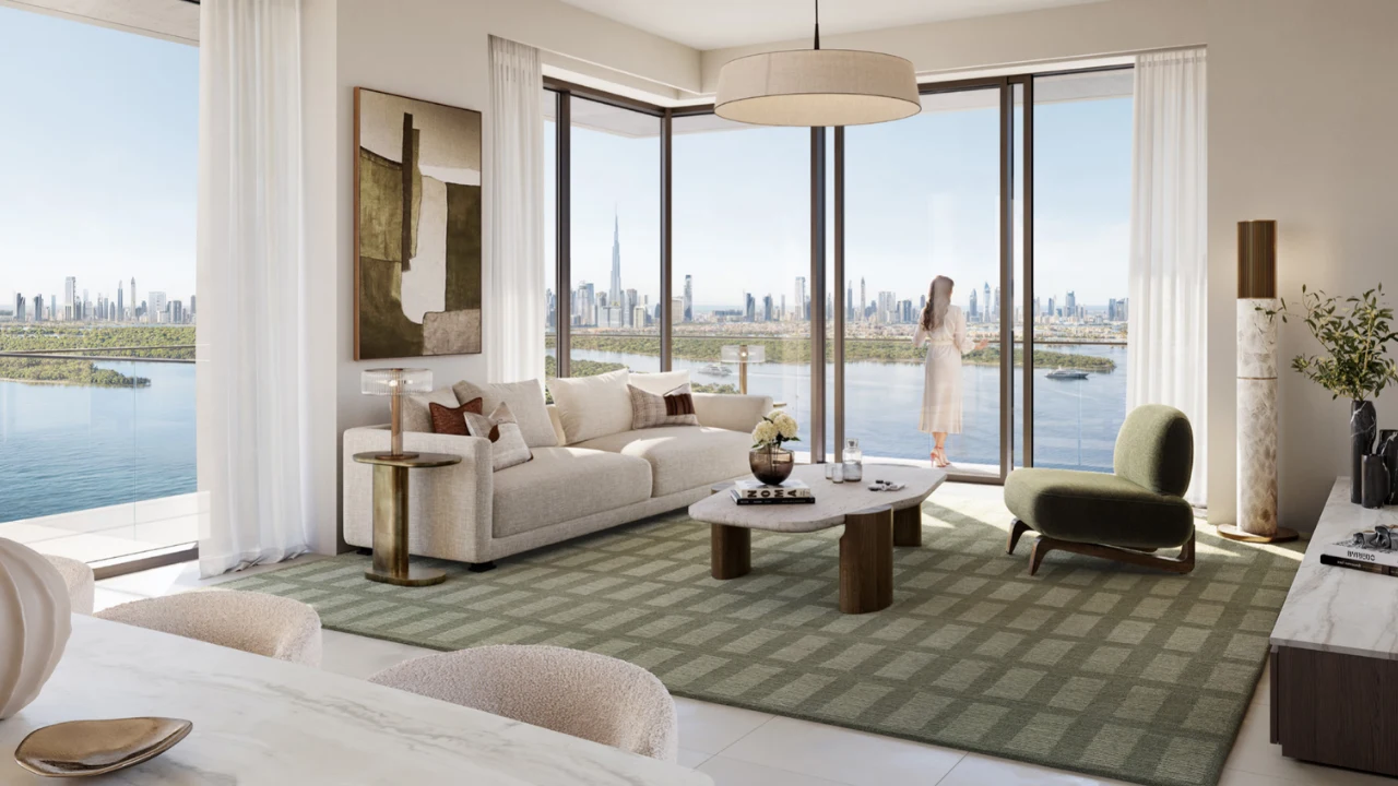 Creek Bay at Dubai Creek Harbour by Emaar Properties contemporary apartment living room with floor to ceiling windows overlooking the Dubai skyline and the Gulf in Dubai Presented by Tohid Fetrat